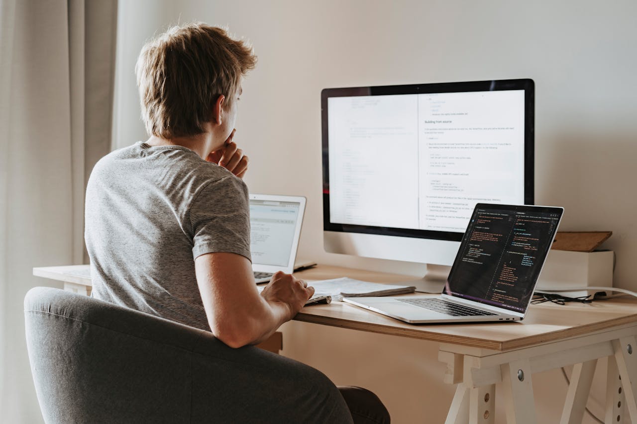 a programmer working at a desk