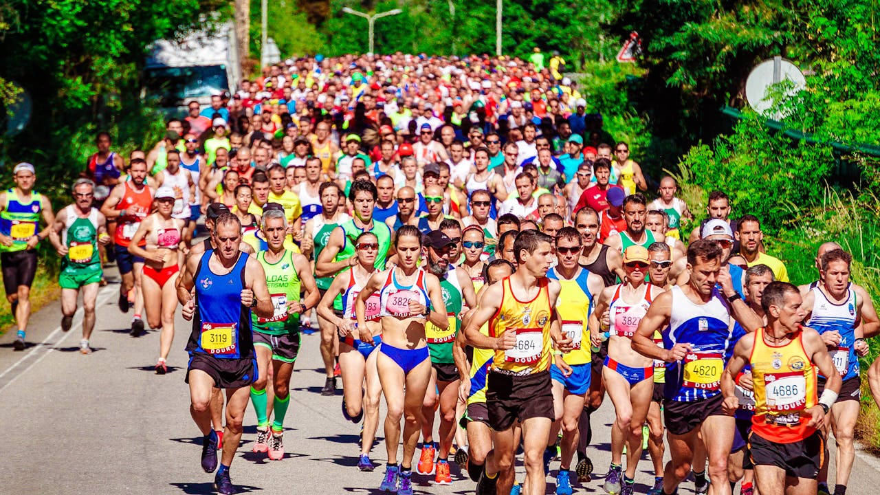 a group of people running a marathon