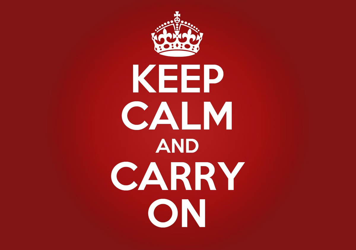 the slogan 'keep calm and carry on' on a red background